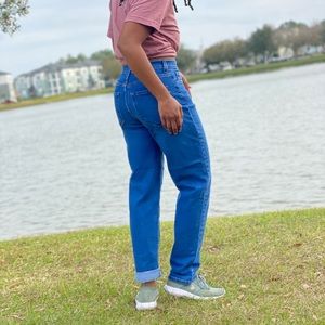 Blue mom jeans with cuffed ankle and relaxed fit
